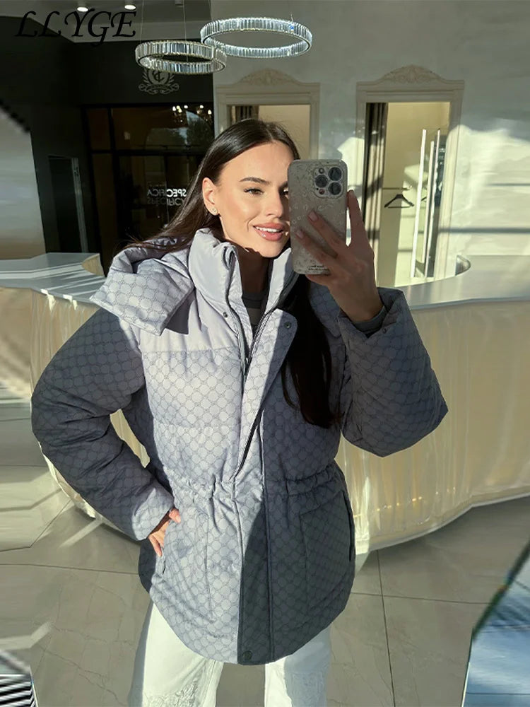 doudoune épaisse femme coupe loose, veste chaude avec cordon de serrage et capuche.