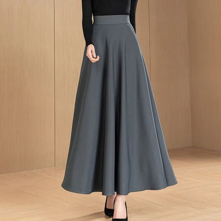 Jupe maternité élégante midi, couleur unie, style maman chic avec poches pratiques pour printemps et automne.Gris