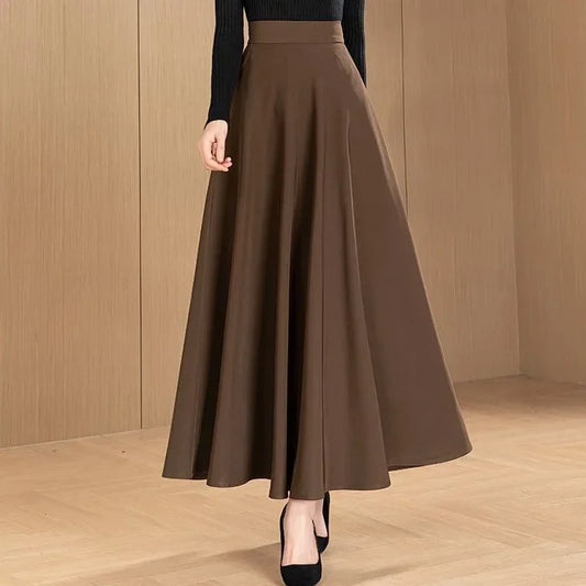 Jupe maternité élégante midi, couleur unie, style maman chic avec poches pratiques pour printemps et automne.Marron