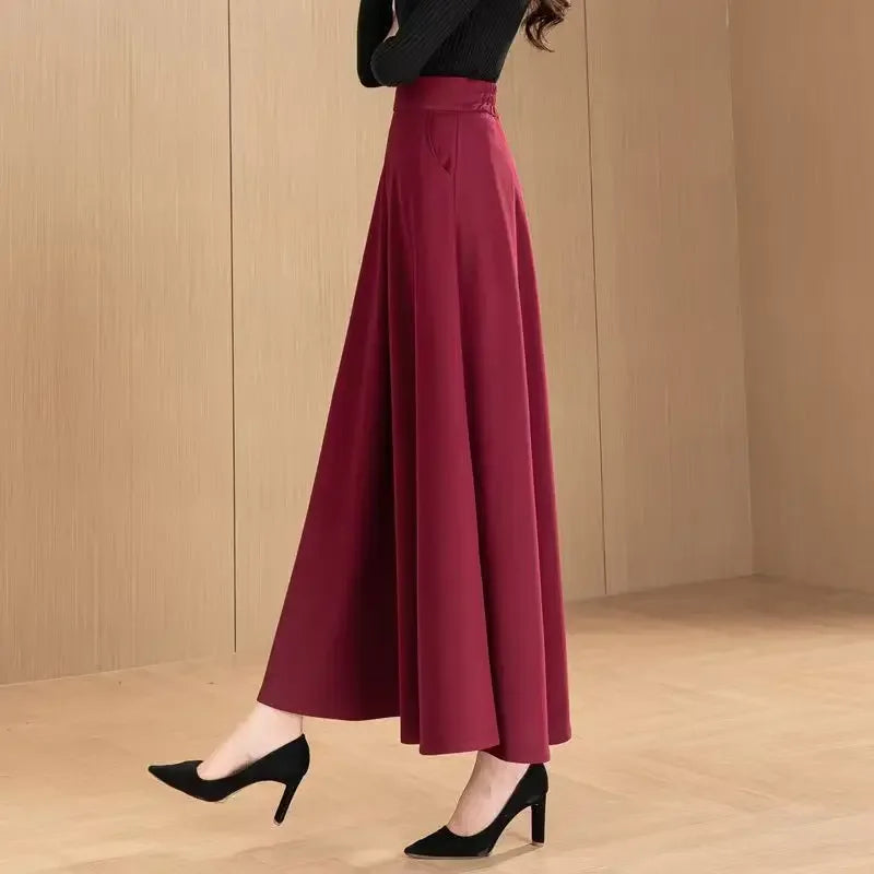 Jupe maternité élégante midi, couleur unie, style maman chic avec poches pratiques pour printemps et automne.Rouge