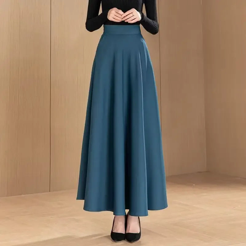 Jupe maternité élégante midi, couleur unie, style maman chic avec poches pratiques pour printemps et automne.Vert